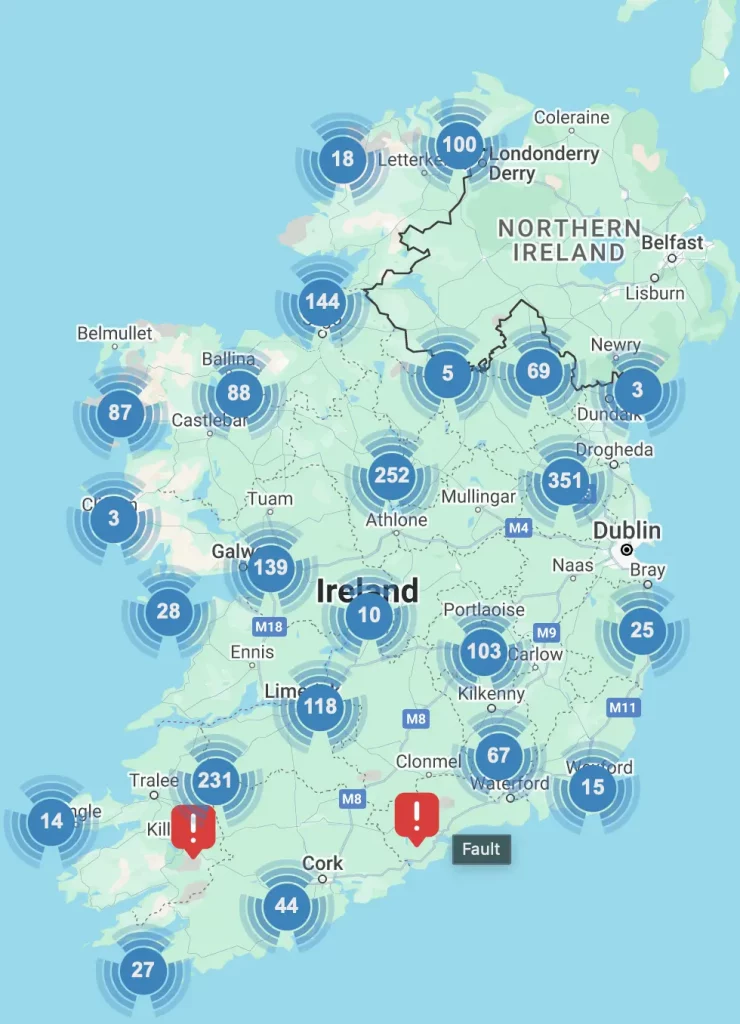 Map of Ireland showing various numeric markers indicating data points, with two red exclamation icons labeled as faults near Cork and Killarney.
